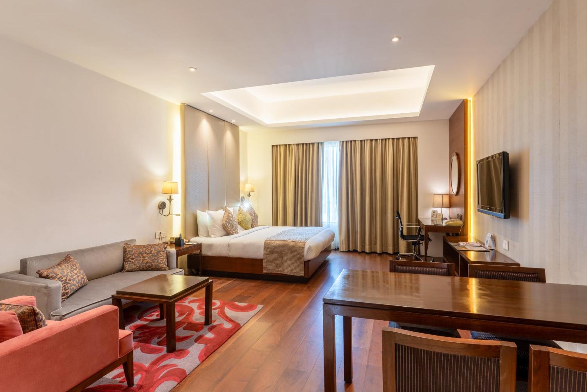 Pride Plaza Hotel, Kolkata Exterior photo A room at the hotel